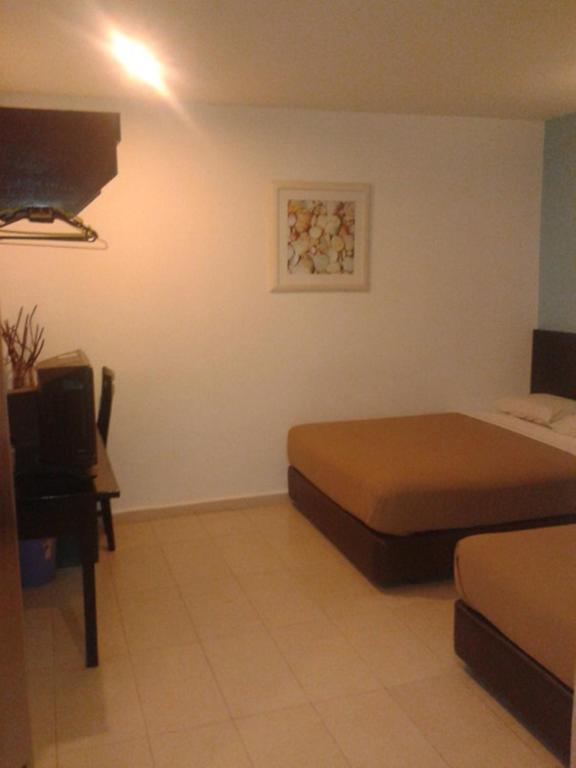 Hotel Ria Johor Bahru Quarto foto